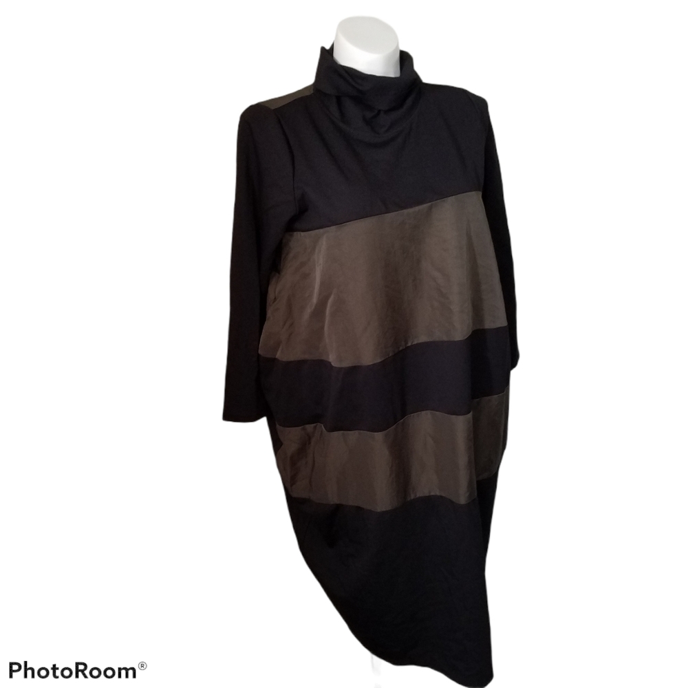 C Yard Dress. Condition is "New with tags".

It do